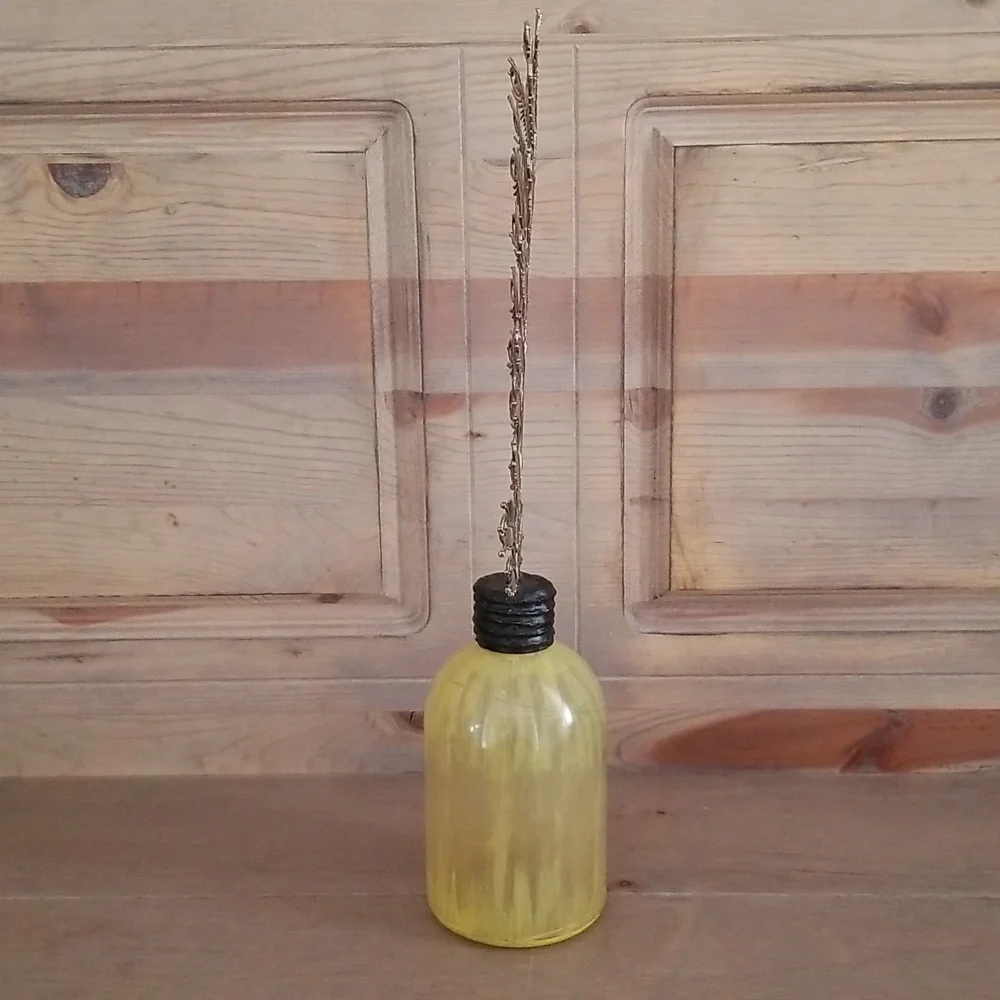 Pottery Barn painted bottle with plume finial
